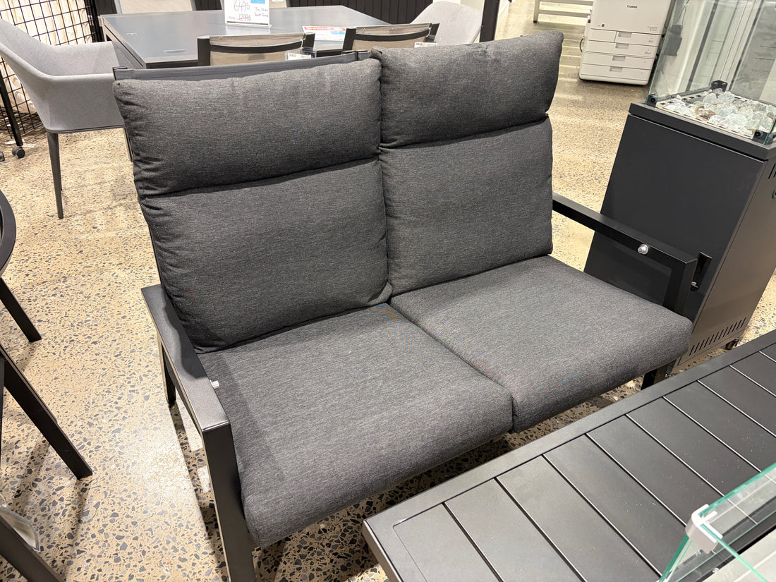 Santa Cruz black 2-seater loveseat with cushion - Store demo with imperfections